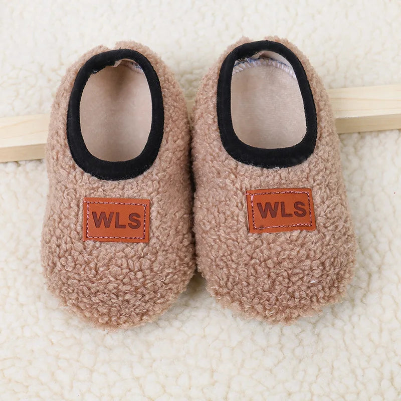 Cozy plush baby slippers