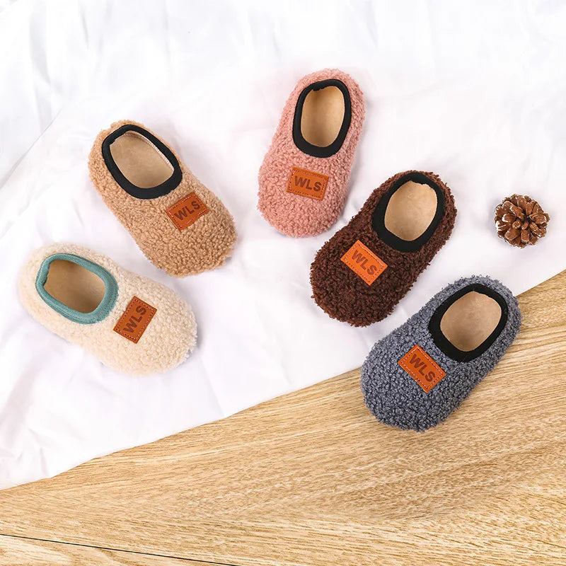 Cozy plush baby slippers
