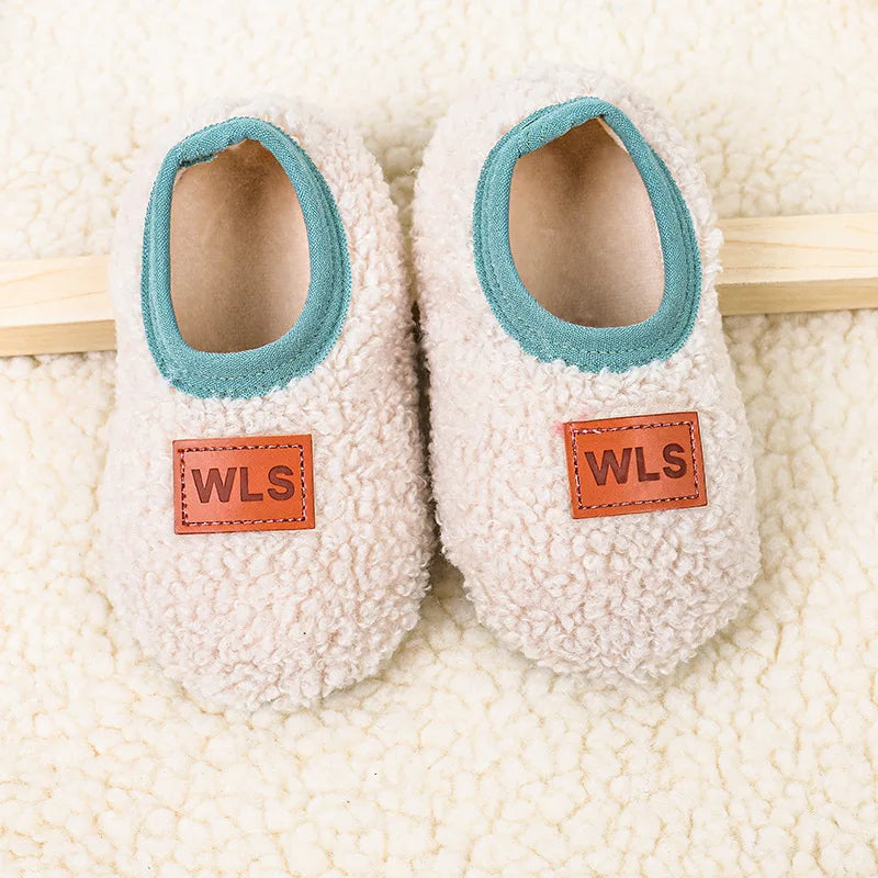 Cozy plush baby slippers