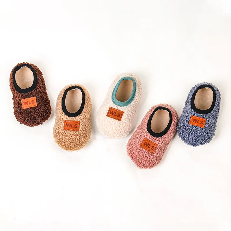 Cozy plush baby slippers