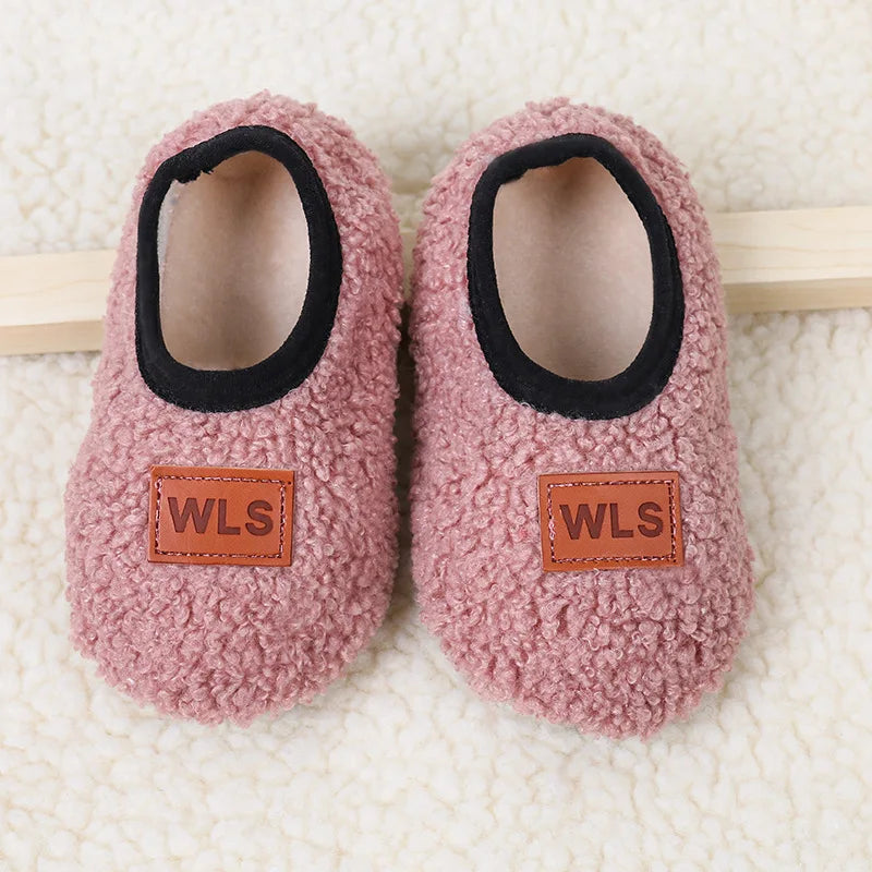 Cozy plush baby slippers